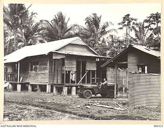 CUTARP PLANTATION, JACQUINOT BAY, NEW BRITAIN. 1944-12-15. THE PLANTATION HOMESTEAD NEAR NAIL'S JETTY. IT WILL BE USED BY 6 FIELD AMBULANCE, 6 INFANTRY BRIGADE AS A DRESSING STATION