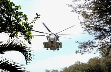 A US Marine Corps (USMC) CH-53E Sea Stallion Helicopter from Heavy Marine Helicopter Squadron 363 (HMH-363) provides support for a Non-Combatant Evacuation Operation (NEO), part of Exercise COBRA GOLD 2003. HMH-363 is home based in Hawaii