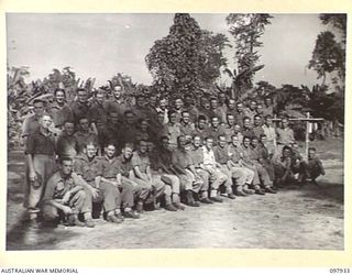 Torokina, Bougainville. 1945-10-12. Members of 61st Battery, 2/11th Field Regiment. Left to right, back row: QX31803 Gunner (Gnr) E. N. Lindley of Brisbane, Qld; VX113598 Gnr H. R. Hawken of ..