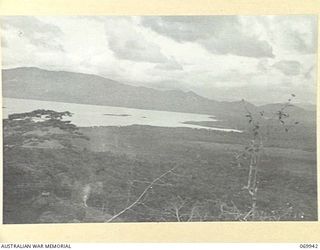 MILNE BAY, NEW GUINEA. 1943-03. A VIEW OF THE BAY FROM THE HILL STATION ROAD
