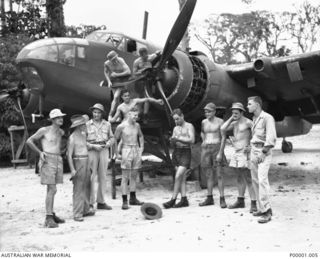 THE SOLOMON ISLANDS, 1945. AUSTRALIAN, NEW ZEALAND AND UNITED STATES AIRMEN AT TOROKINA WITH A BRISTOL BEAUFORT AIRCRAFT OF NO 10 LOCAL AIR SUPPLY UNIT, RAAF, WHICH WAS BEING SERVICED. (RNZAF ..