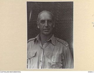 LAE AREA, NEW GUINEA, 1945-07-13. MAJOR B.J.F. WRIGHT, PERSONAL ASSISTANT TO LIEUTENANT-GENERAL V.A.H. STURDEE, GENERAL OFFICER COMMANDING FIRST ARMY