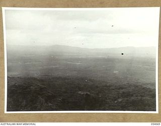 MILNE BAY, NEW GUINEA, 1943-07-12. PANORAMIC VIEW OF THE AREA AT THE BACK OF MILNE BAY, TAKEN FROM HILL STATION ROAD, LOOKING IN THE DIRECTION OF THE WAIGARI AREA