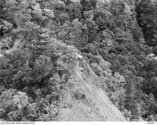 FARIA VALLEY, NEW GUINEA. 1944-01-11. LOOKING DOWN FROM THE PLATEAU ON TO THE MORTAR AND MEDIUM MACHINE GUN POSITION OF THE 2/10TH INFANTRY BATTALION