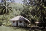 French Polynesia, thatched-roofed cottage on Tahiti Island