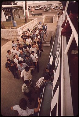 "SEA TRANSIT" FERRY HAS BEEN OPERATING FOR ONE YEAR BETWEEN DOWNTOWN HONOLULU AND PEARL HARBOR - AN ALTERNATIVE TO FREEWAY CONGESTION. IT ALSO CARRIES MILITARY-RELATED EMPLOYEES ACROSS PEARL HARBOR TO THE PARKING LOT - SAVING THEM A 45-MINUTE DRIVE. BOARDING THE FERRY