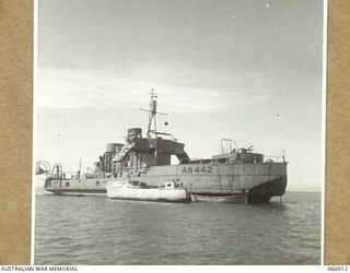 NEW GUINEA. 1944-06-15. THE AB442 A VESSEL OF THE 12TH WATER TRANSPORT OPERATING COMPANY, WHICH IS THE LARGEST SHIP OPERATED BY THE UNTI. THIS SHIP WAS FORMERLY THE "JESSY FRANCES PEAT", A VESSEL ..