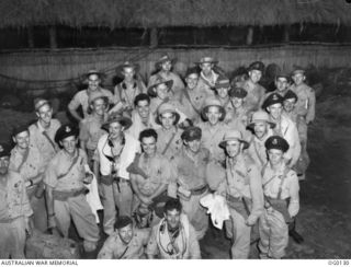 KIRIWINA ISLAND, PAPUA NEW GUINEA. C. 1943-10. GROUP PORTRAIT OF CREWS OF NO. 8 (BEAUFORT) SQUADRON RAAF WHO TOOK PART IN THE AIR ATTACK ON RABAUL, JUST BACK BEFORE SUN-UP FROM IMPORTANT NIGHT ..