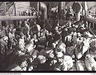 NAURU ISLAND. 1945-09-18. JAPANESE POWS ON THE DECKS OF THE RAN VESSEL, THE HMAS GLENELG DURING THEIR EVACUATION TO BOUGAINVILLE SOON AFTER TROOPS OF THE 31/51ST INFANTRY BATTALION TOOK OVER THE ..