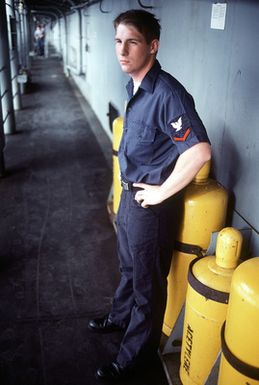 A crewman aboard the amphibious assault ship USS SAIPAN (LHA-2) during exercise Ocean Venture '81