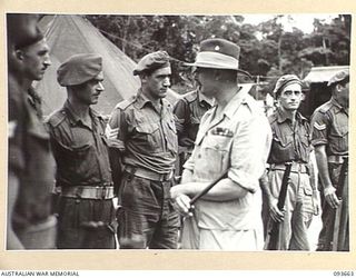 HONGORAI RIVER, SOUTH BOUGAINVILLE, 1945-07-04. HIS ROYAL HIGHNESS, THE DUKE OF GLOUCESTER, GOVERNOR-GENERAL OF AUSTRALIA (1), SPEAKING WITH WARRANT OFFICER 2 M. WHITLAM, 15 INFANTRY BATTALION (2), ..