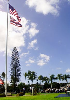 Members of the Hickam AFB, Hawaii (HI) community and World War II veterans gather for the Zero Fighter Pilots Association Flagpole Ceremony. This event was held at Hickam AFB to commemorate the attack on Hickam Field during the Japanese invasion