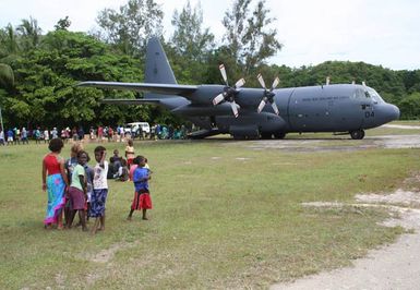 Unloading supplies, Munda, Solomon Islands