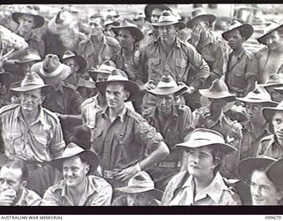 LAE, NEW GUINEA, 1946-01-28. A SECTION OF THE SERVICE PERSONNEL AT THE OTHER RANKS' CLUB, WHO ATTENDED THE ADDRESS BY THE HONOURABLE F. M. FORDE, MINISTER FOR THE ARMY, WHO IS ON AN INSPECTION TOUR ..