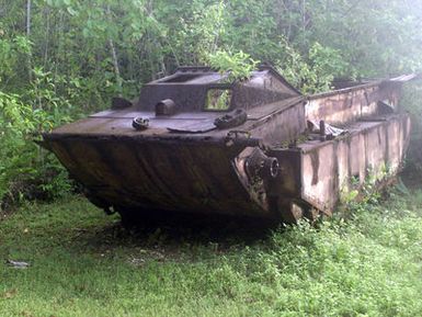 A Landing Vehicle Tracked (Mark II), LVT-2 that was left after the Battle of Peleliu during World War Two on the island of Peleliu. Photograph taken as part of Exercise KOA THUNDER 2001. Marines from Aviation Support Element, Kaneohe Bay, Hawaii, 1ST Marine Air Wing, Okinawa, Japan, and 3rd Marines 7th Battalion 29 Palms, California, participated in KOA THUNDER on the island of Guam from July 9 to July 14. The purpose of the exercise was to demonstrate the Marine Corps ability to deploy in the South Pacific from places other than Okinawa, Japan