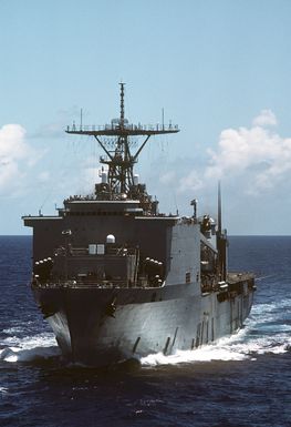 A port bow view of the dock landing ship USS GERMANTOWN (LSD-42) underway off Saipan during Operation Tandem Thrust