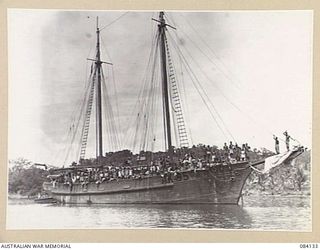 JACQUINOT BAY, NEW BRITAIN, 1944-12-08. THE KETCH AK95, NO. 12 SMALL SHIPS COMPANY, ARRIVING OFF WUNUNG PLANTATION CARRYING NATIVES FROM THE ARAWE AREA FOR WORK IN THIS AREA