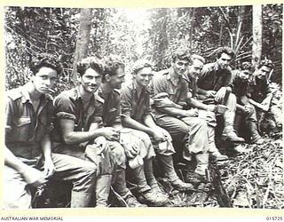 1943-09-15. NEW GUINEA. GOODVIEW JUNCTION. MEMBERS OF A SMALL A.I.F. UNIT AFTER THEY HAD RETURNED FROM A PATROL AT GOODVIEW JUNCTION, SEVERAL MILES FROM SALAMAUA. THE PATROL INFLICTED NUMEROUS ..