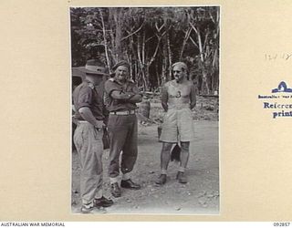 NANTAMBU, NEW BRITAIN. 1945-06. LIEUTENANT S.P. LONGWORTH, 2/14 FIELD REGIMENT (1), MAJOR J.W. CLARKSON, SECOND IN CHARGE 37/52 INFANTRY BATTALION (2) AND CAPTAIN P.K. SEARLE, ALLIED INTELLIGENCE ..