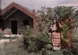 New Zealand--small house and woman, 1928