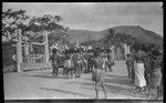 Motu men in circle, drumming and dancing near a dubu platform at Gaile, also spelled Gaire, a village in Central Province