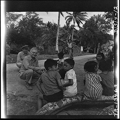 Capt. E.J. Steichen, Navy combat photographer, photographs native children on Guam Island.