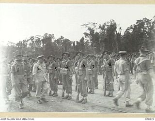 BOUGAINVILLE ISLAND. 1945-01-30. VX13 LIEUTENANT GENERAL S.G. SAVIGE, CB, CBE, DSO, MC, ED, GENERAL OFFICER COMMANDING, 2ND AUSTRALIAN CORPS (2) ACCOMPANIED BY NX101365 LIEUTENANT J.A. BICKLE, ..