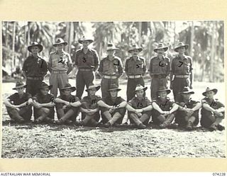 SIAR, NEW GUINEA. 1944-06-23. OFFICERS AND NON COMMISSIONED OFFICERS OF BATTALION HEADQUARTERS, 57/60TH INFANTRY BATTALION. IDENTIFIED PERSONNEL ARE:- VX84582 WARRANT OFFICER II, M.J. SAINSBERY ..