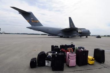 Flooding ^ Tsunami - Atlanta, Ga. , October 2, 2009 -- Luggage from approximately 30 FEMA Logistics (LOG) staff is ready for loading on the C-17 at Dobbins Air Force Base. FEMA is on the way to Samoa to set up logistical assistance in response to the recent devastating tsunami. George Armstrong/FEMA