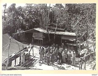 CAPE CUNNINGHAM, JACQUINOT BAY, NEW BRITAIN. 1945-09-01. PERSONNEL OF 8 RADAR DETACHMENT ROYAL AUSTRALIAN ARTILLERY IN THEIR CAMP AREA