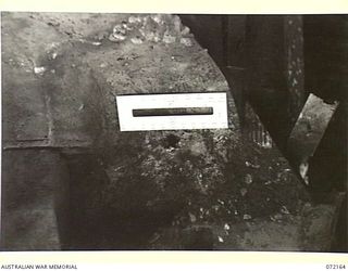 FORTIFICATION POINT, NEW GUINEA. 1944-04-06. THE FRONTAL ARMOUR OF A DISABLED MATILDA TANK SHOWING THE EFFECT OF FIRE POWER FROM A JAPANESE 75MM FIELD GUN PACK TYPE MEIJI 41 FIRED BY MEMBERS OF THE ..