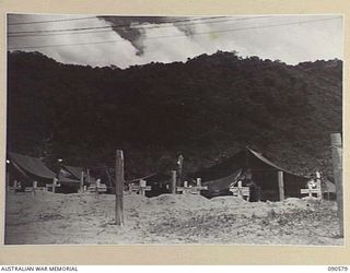 BUT, NEW GUINEA. 1945-04-08. A TEMPORARY WAR CEMETERY ESTABLISHED AT BUT