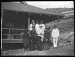 Director of Papua Health Services and Lambert's health survey assistants; H on uniforms stands for Hookworm