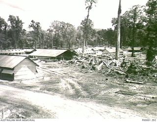 THE SOLOMON ISLANDS, 1945-10-18. GENERAL VIEW OF THE CAMP BUILT FOR THE TEMPORARY INTERNMENT OF JAPANESE SERVICE PERSONNEL AT TOROKINA, BOUGAINVILLE ISLAND. (RNZAF OFFICIAL PHOTOGRAPH.)