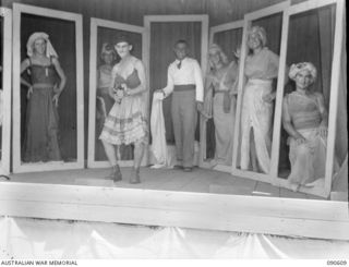 TOROKINA, BOUGAINVILLE. 1945-04-12/13. A SCENE FROM THE VOCAL "A PRETTY GIRL IS LIKE A MELODY", DURING A CONCERT STAGED BY 45 MEMBERS OF 7 FIELD AMBULANCE FOR THE ENTERTAINMENT OF UNIT PERSONNEL, ..