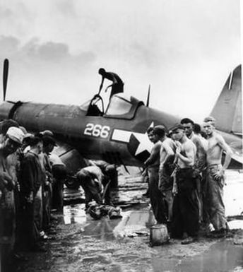 [Dead Japanese Sniper Below Marine's Plane]