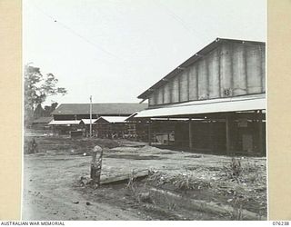 LAE, NEW GUINEA, 1944-09-27. STORAGE BUILDINGS AT THE 43RD FIELD ORDNANCE DEPOT