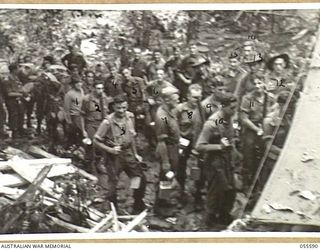 BUI EO CREEK, NEW GUINEA, 1943-08-07. MESS PARADE OF THE 17TH AUSTRALIAN INFANTRY BRIGADE HEADQUARTERS. SHOWN ARE:-QX9853 LANCE CORPORAL J. BARNES (1); VX2999 STAFF SERGEANT L. ALMOND (2); VX52093 ..