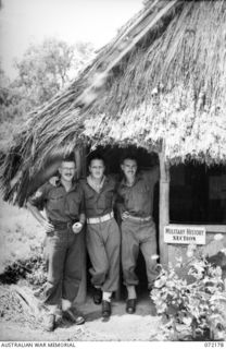 PORT MORESBY, NEW GUINEA. 1944-04-10. OFFICIAL WAR PHOTOGRAPHERS OF THE MILITARY HISTORY SECTION AT HEADQUARTERS NEW GUINEA FORCE. IDENTIFIED PERSONNEL ARE, LEFT TO RIGHT:- VX88782 SERGEANT R. KEAM ..