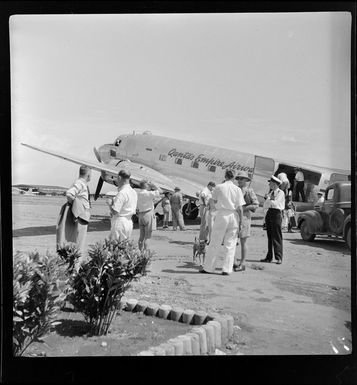 Qantas Empire Airways, Bird of Paradise service, unloading cargo from Douglas DC-3, Lae, Morobe, Papua New Guinea