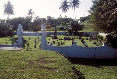 An overall view of the Sumay Memorial Cemetery. It is all that remains of the pre-war village of Sumay which was destroyed during the Liberation of Guam in World War II. There are approximately 157 graves at the site along the Guam Historical Trail