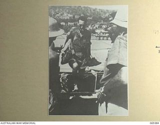 PORT MORESBY, NEW GUINEA. 1942-04-12. SERGEANT S. COSTELLO, NEW GUINEA VOLUNTEER RIFLES, ONE OF THE EVACUEES, WHO WITH 155 OTHERS, COMPRISING SERVICE PERSONNEL AND CIVILIANS, WAS SUCCESSFULLY ..