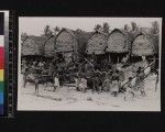 Men launching canoes, Mailu, Papua New Guinea, ca.1910-1920