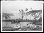 Boys bathing and boats in bay at Waiakea near Hilo, Hawaii