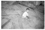 Child on excavation site