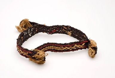 Bracelet of braided mycelium with decoration of coloured leaf bars