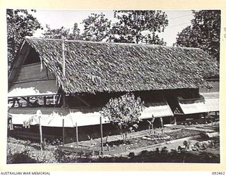 LAE AREA, NEW GUINEA. 1945-05-25. GENERAL VIEW OF THE DENTAL POST, 54 DENTAL UNIT, VIEWED FROM THE WORKROOM END OF THE BUILDING. NOTE THE VENTILATION AND LIGHTING SYSTEM