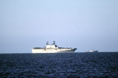 A starboard beam view of the amphibious assault ship USS SAIPAN (LHA-2) during NATO exercise Northern Wedding '86