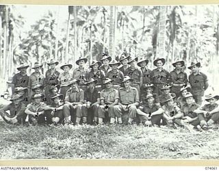 SIAR PLANTATION, MADANG, NEW GUINEA. 1944-06-20. PERSONNEL OF 3RD SUPPLY DEPOT PLATOON. IDENTIFIED ARE:- VX70853 PRIVATE H.G. PEVITT (1); V315248 PRIVATE K.H. COOK (2); NX164537 SERGEANT S.H. ..