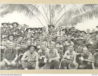 JACQUINOT BAY, NEW BRITAIN. 1944-11-26. TROOPS OF THE 13TH FIELD COMPANY, ENJOYING A CUP OF TEA OUTSIDE THE UNIT SALVATION ARMY RED SHIELD HUT. FOR IDENTIFICATION OF 47 PERSONNEL SEE FILE